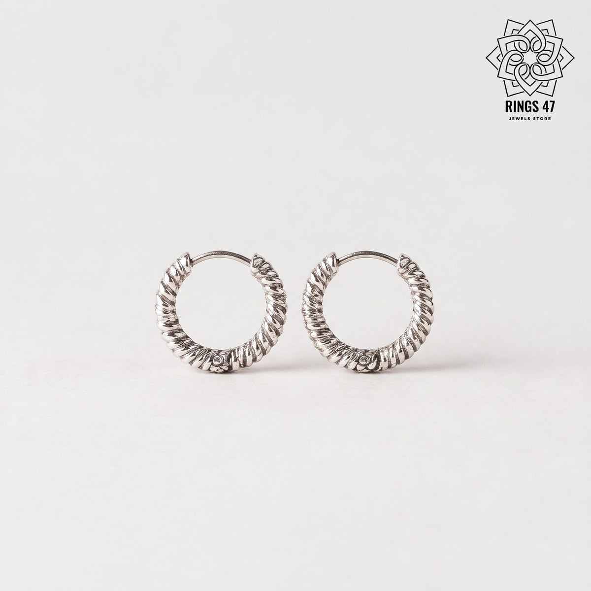 Paire de créoles torsadées en acier inoxydable argentées, diamètre 1,2 cm